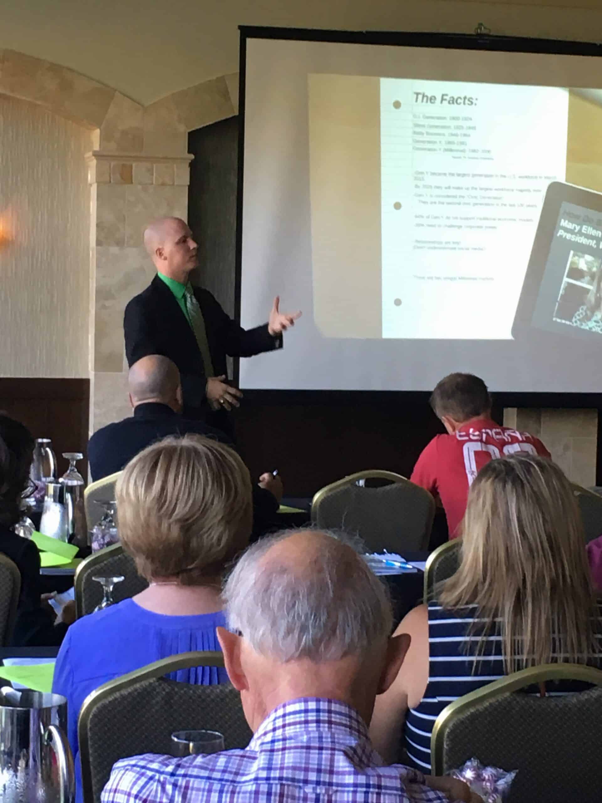 Seth Barnett speaks to an audience in the NWPMA 2016 Fall Showcase.