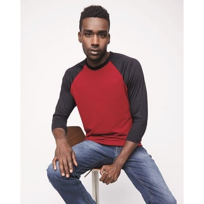 man wearing red baseball raglan shirt with charcoal gray sleeves