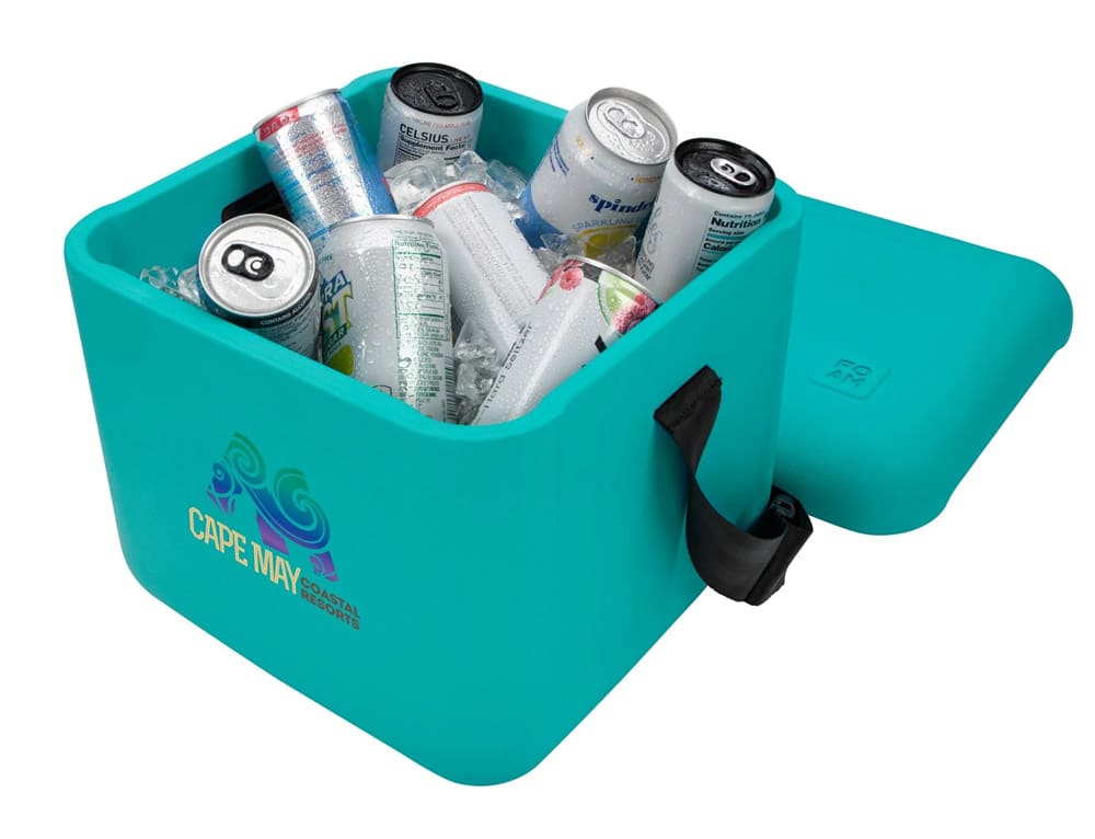 turquoise foam cooler with blue logo and filled with ice and canned beverages
