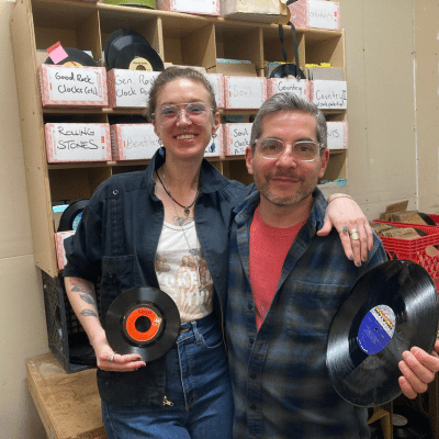 Amy and Jeff holding records